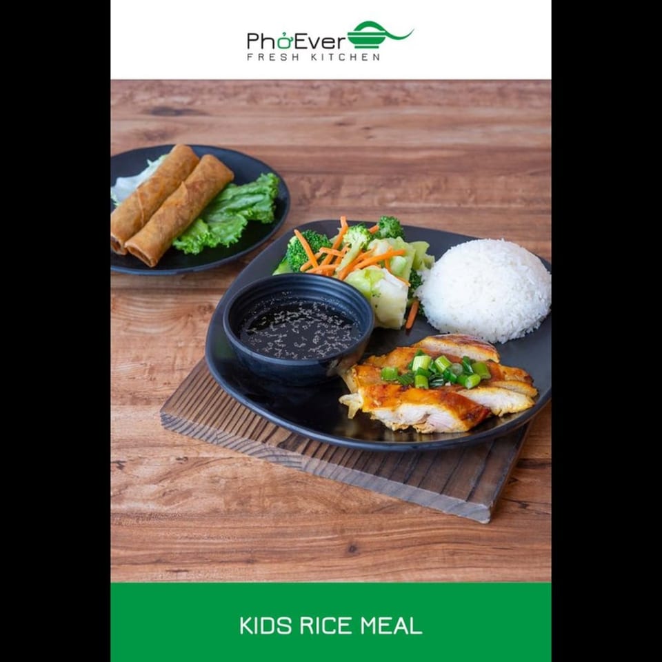 Pho'Ever Fresh Kitchen's Kids Rice Meal with chicken, rice, vegetables, sauce, and egg rolls.